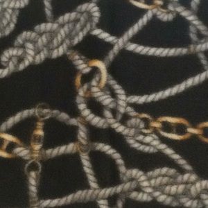 Scarf Rope and a Gold Chain Link on Black